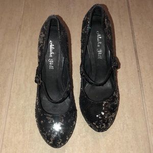 Black and silver sequin platform pumps